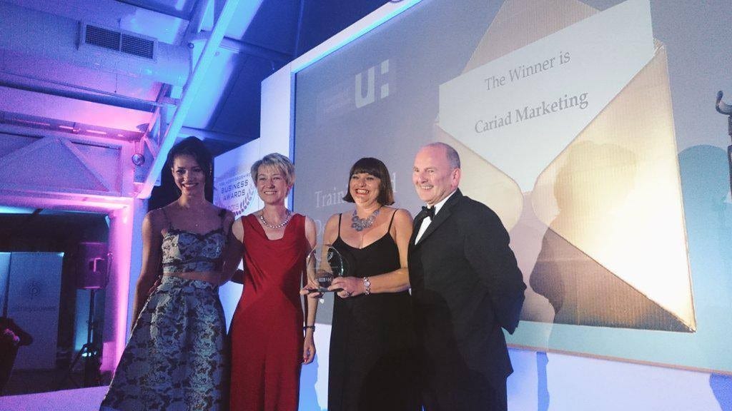 Justine Perry and Lesley Willies of Cariad Marketing collect the FSB Herts Award for Training and Development