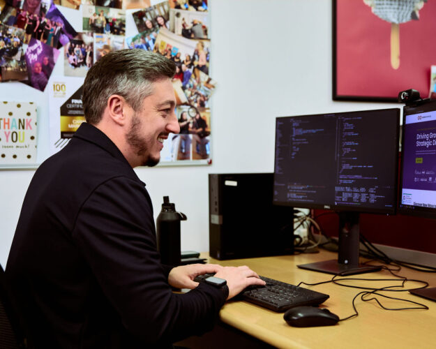 cariad-marketing-team-working-in-their-hertford-office