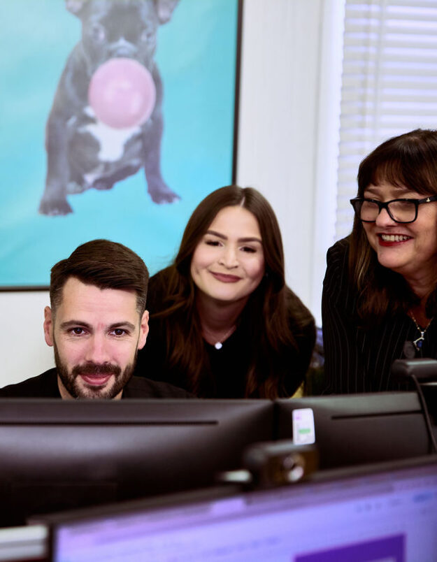 cariad-marketing-team-working-in-their-hertford-office