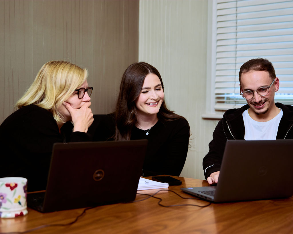 cariad-marketing-team-working-in-their-hertford-office